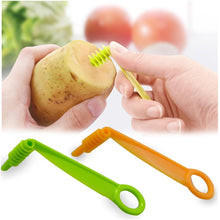 Handy spiral knife for slicing vegetables into curly spirals for creative cooking.