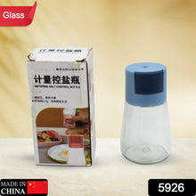 Salt dispenser with clear glass design